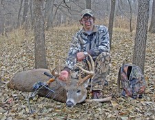 matrhew white hair and his 169 buck. shot him while still hunting! 2009